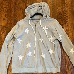 mint distressed star zip up